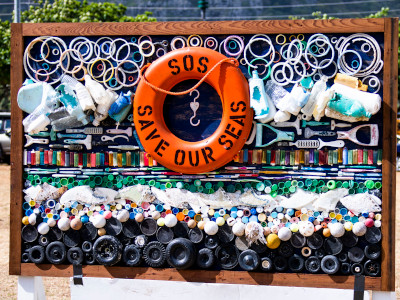 Save our Seas sign made of beach trash to raise awareness of litter pollution. Photo by Jonathan Sloan/U.S. Marine Corps